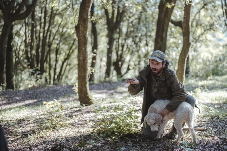 person with a truffle on the hand
