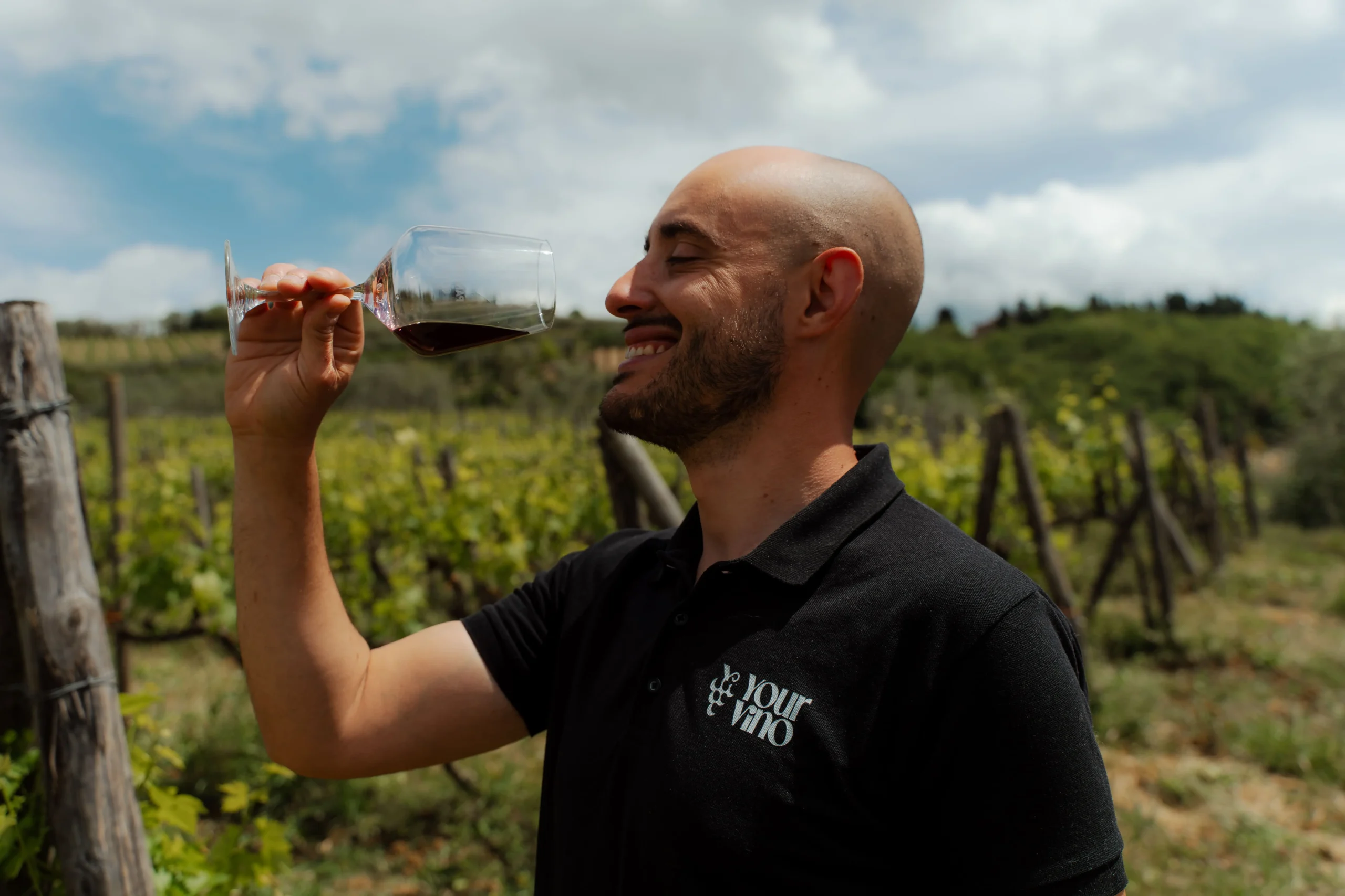 person drinking some wine
