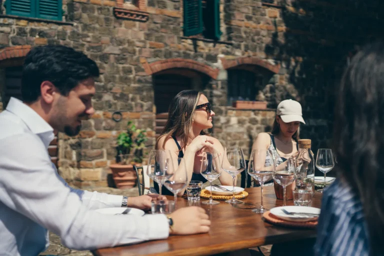 Afternoon wine tasting outdoors at a Chianti winery