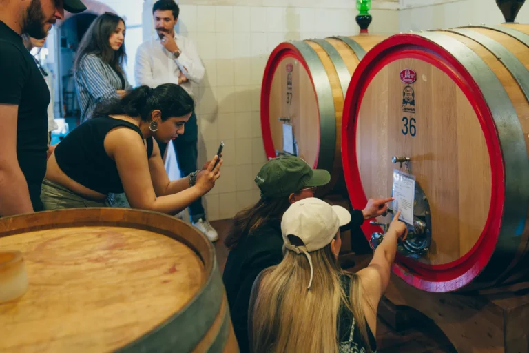 Tasting wine straight from the barrel in a Chianti cellar