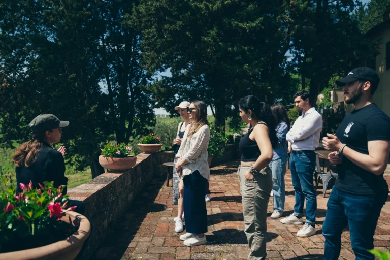 Small group on the terrace of a Chianti winery during the full day wine tour